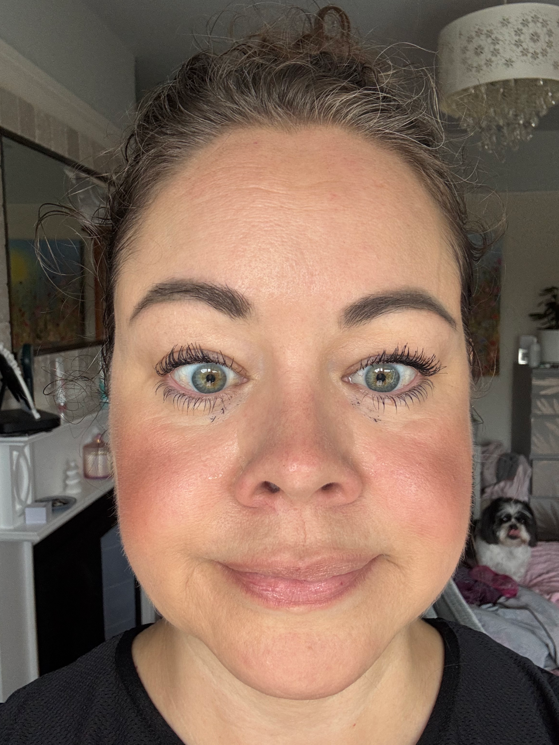 Leanne's eyes looking down at the camera with smudges underneath